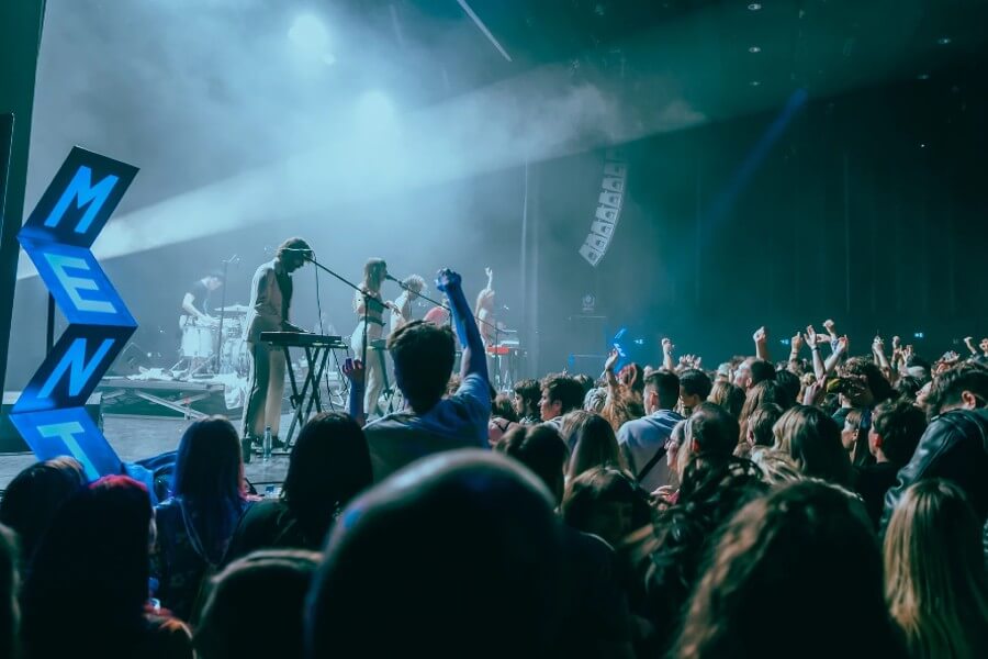 live band plays in front of the crowd at one of the top music conferences in Europe