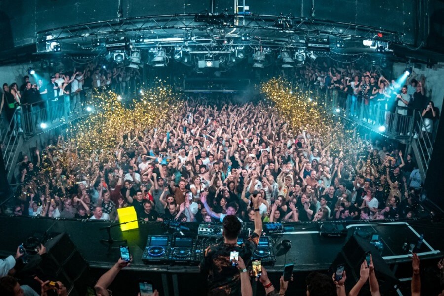 View from the DJ booth of a crowd in a club