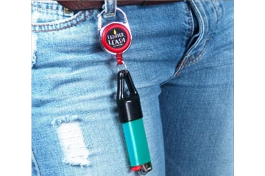 lighter on a leash attached to someones pants