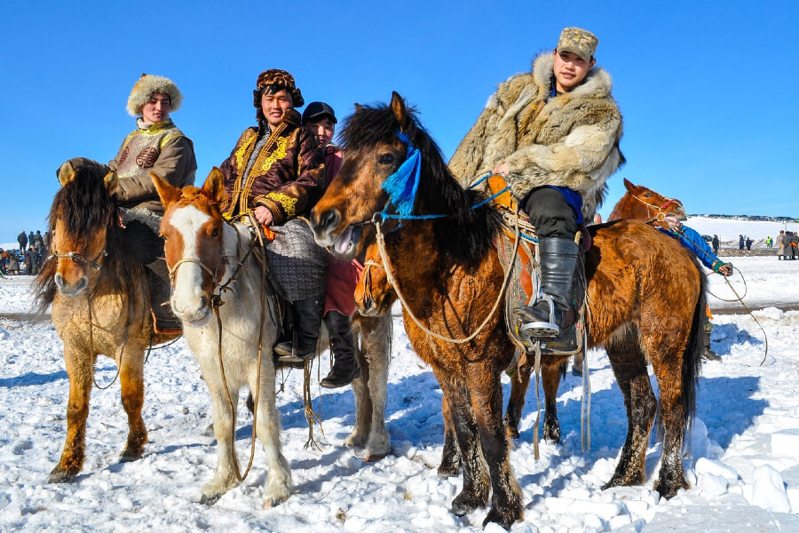 Tuvan / Mongolian men in the snow