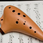 Ocarina on sheet music