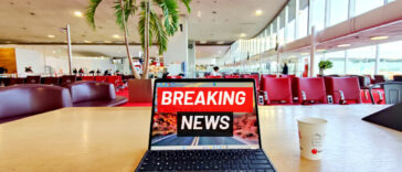 computer stating Breaking News at the gate in CDG airport