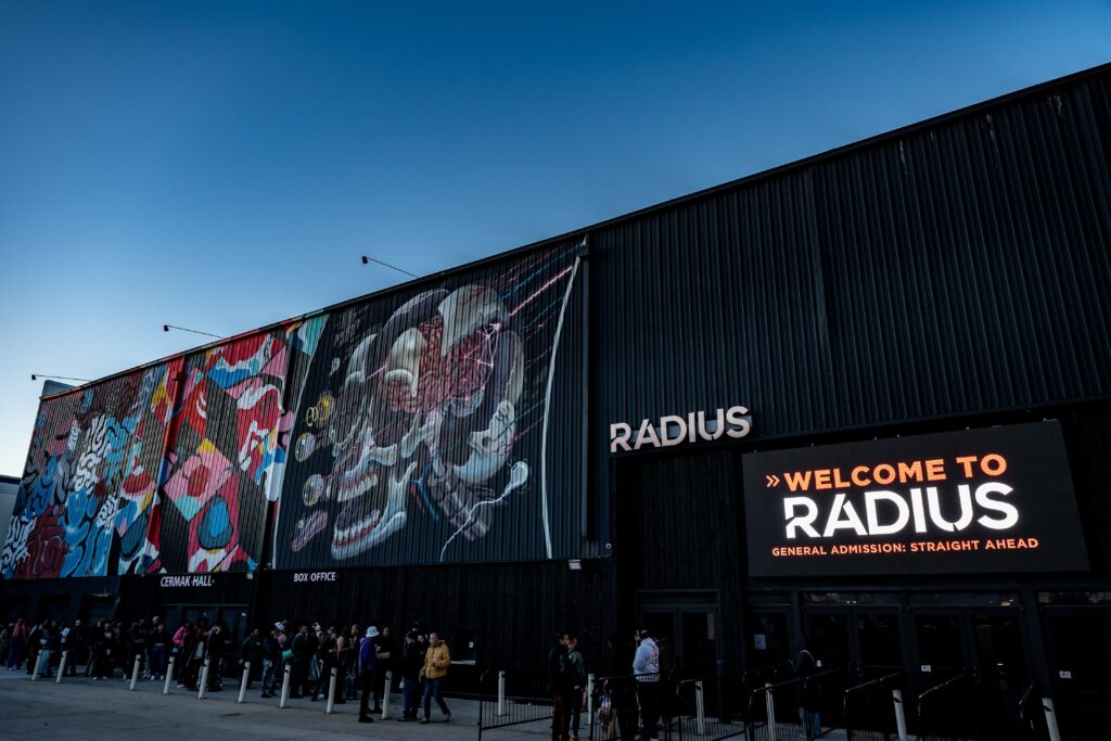 Front of the Radius venue highlighted by a mural of a skull and a Radius sign.