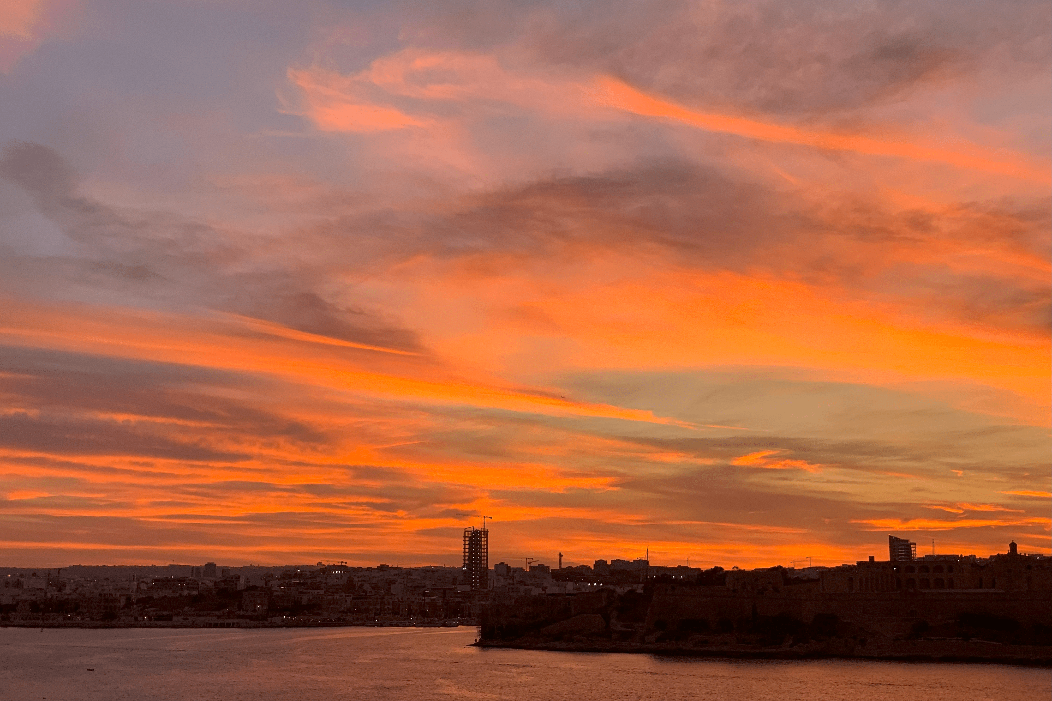 Red sunset looking from Valletta