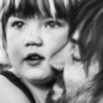 Father hugging girl in black and white