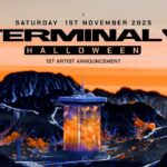 Terminal V Halloween poster with futurist tower in front of an orange sky.